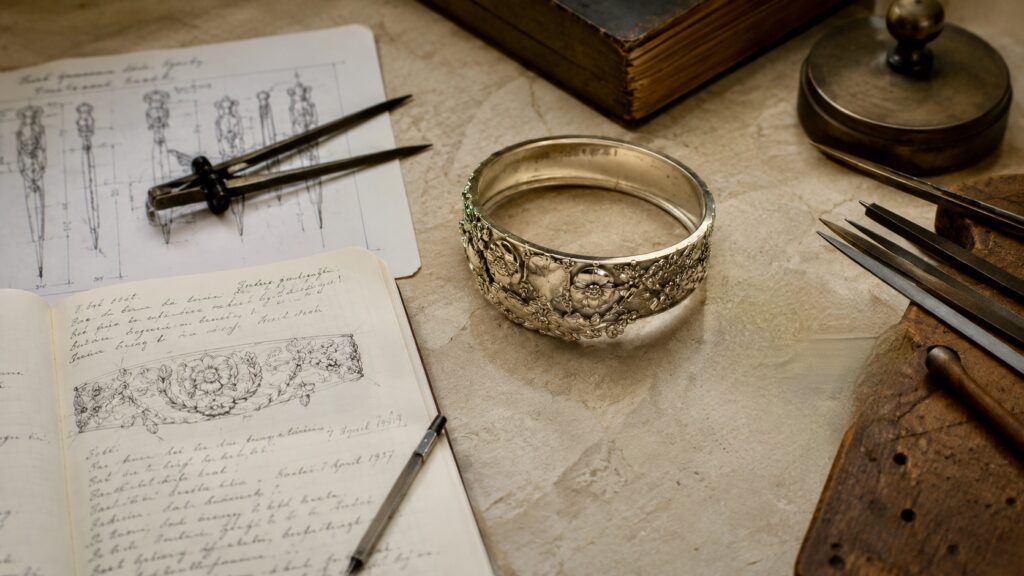 Jeweller’s workspace with design sketches